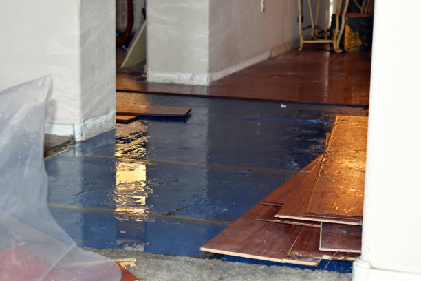 Professional Flood Cleanup technician working in Baldwin, NY